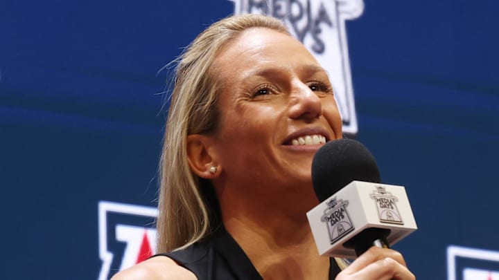 Oct 21, 2025; Kansas City, MO, USA; Arizona head coach Becky Burke speaks to media during Big 12 Womenís Basketball Media Day at T-Mobile Center. Mandatory Credit: Sophia Scheller-Imagn Images