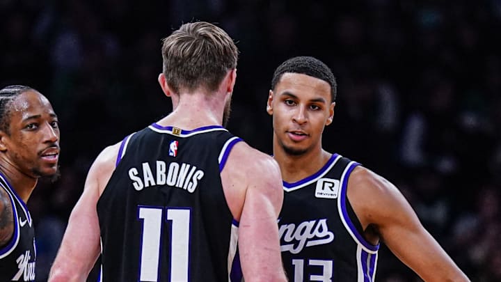 Jan 10, 2025; Boston, Massachusetts, USA; Sacramento Kings forward DeMar DeRozan (10), forward Keegan Murray (13) and forward Domantas Sabonis (11) react after defeating the Boston Celtics at TD Garden. Jan 10, 2025; Boston, Massachusetts, USA; Sacramento Kings forward DeMar DeRozan (10), forward Keegan Murray (13) and forward Domantas Sabonis (11) react after defeating the Boston Celtics at TD Garden.
