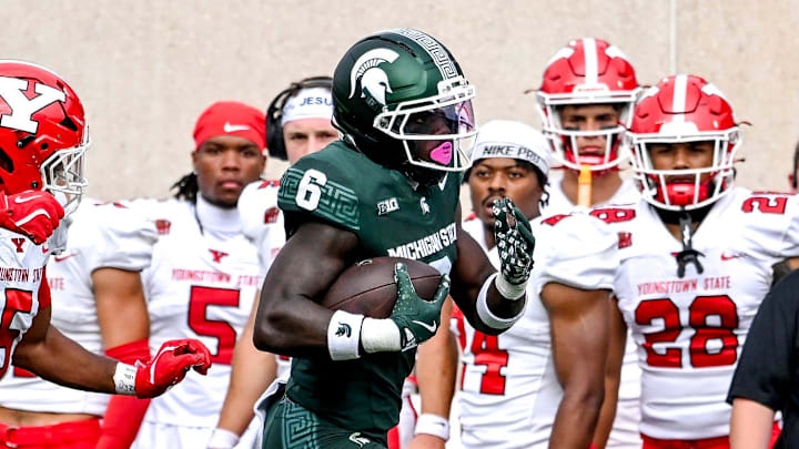 Michigan State's Nick Marsh, right, runs after a catch as Youngstown State's Carston Marshall follows behind during the second quarter on Saturday, Sept. 13, 2025, at Spartan Stadium in East Lansing.