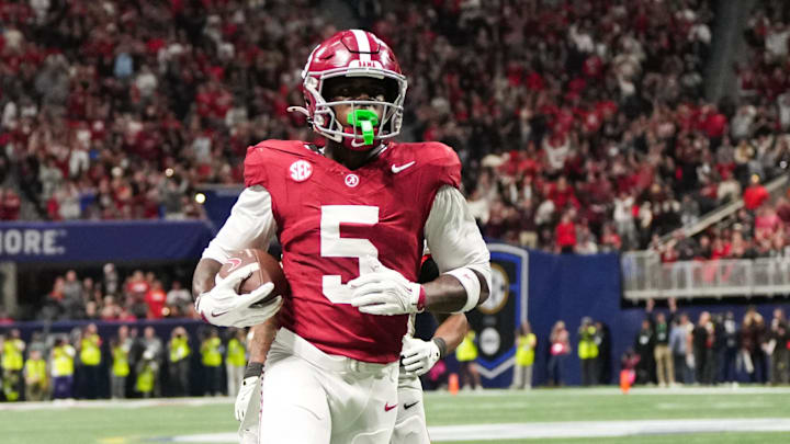 Dec 6, 2025; Atlanta, GA, USA; Alabama Crimson Tide wide receiver Germie Bernard (5) scores a touchdown during the fourth quarter against the Georgia Bulldogs during the 2025 SEC Championship game at Mercedes-Benz Stadium. Mandatory Credit: Dale Zanine-Imagn Images