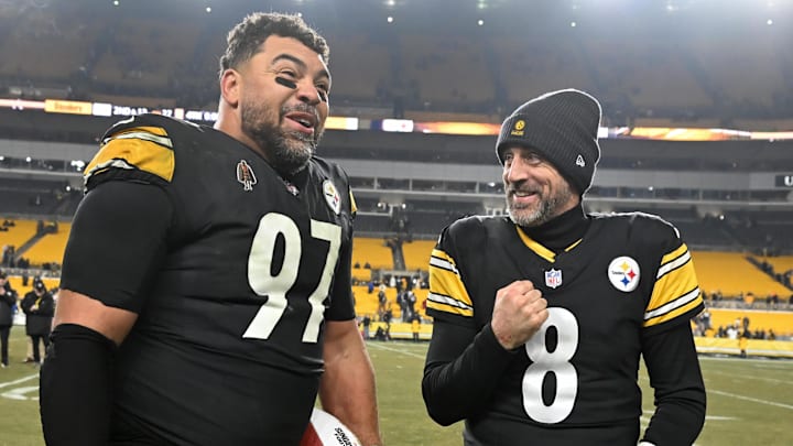 Pittsburgh Steelers defensive tackle Cameron Heyward (97) and quarterback Aaron Rodgers (8) Pittsburgh Steelers defensive tackle Cameron Heyward (97) and quarterback Aaron Rodgers (8)
