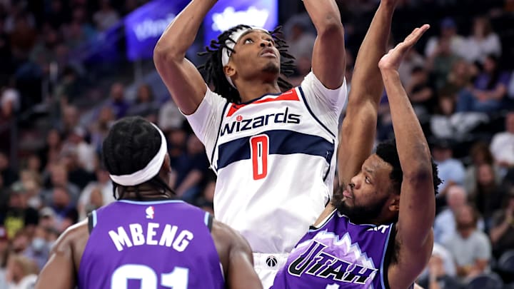 Mar 25, 2026; Salt Lake City, Utah, USA;  Washington Wizards guard Bilal Coulibaly (0) shoots the ball over Utah Jazz guard Elijah Harkless (16) during the second quarter at Delta Center. Mandatory Credit: Chris Nicoll-Imagn Images