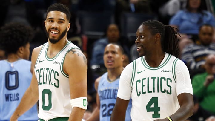 Mar 31, 2025; Memphis, Tennessee, USA; Boston Celtics forward Jayson Tatum (0) reacts with Boston Celtics guard Jrue Holiday (4) during the third quarter against the Memphis Grizzlies at FedExForum. Mandatory Credit: Petre Thomas-Imagn Images Mar 31, 2025; Memphis, Tennessee, USA; Boston Celtics forward Jayson Tatum (0) reacts with Boston Celtics guard Jrue Holiday (4) during the third quarter against the Memphis Grizzlies at FedExForum. Mandatory Credit: Petre Thomas-Imagn Images