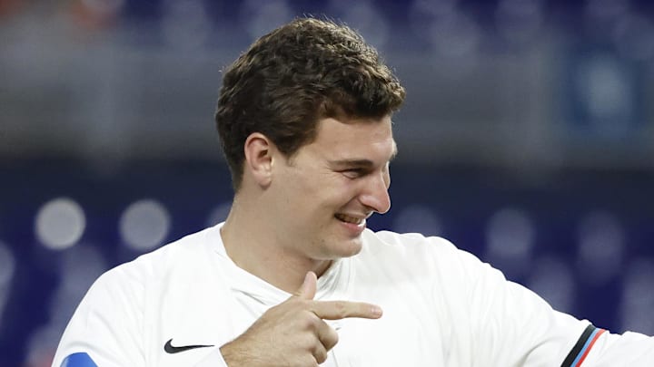 Apr 21, 2026; Miami, Florida, USA;  Indiana Hoosiers quarterback Fernando Mendoza reacts after throwing the ceremonial first pitch before a game between the Miami Marlins and the St. Louis Cardinals at loanDepot Park. Mandatory Credit: Rhona Wise-Imagn Images