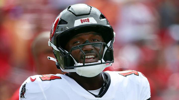 Sep 8, 2024; Tampa, Florida, USA; Tampa Bay Buccaneers wide receiver Chris Godwin (14) looks on against the Washington Commanders works out prior to the game at Raymond James Stadium. Mandatory Credit: Kim Klement Neitzel-Imagn Images