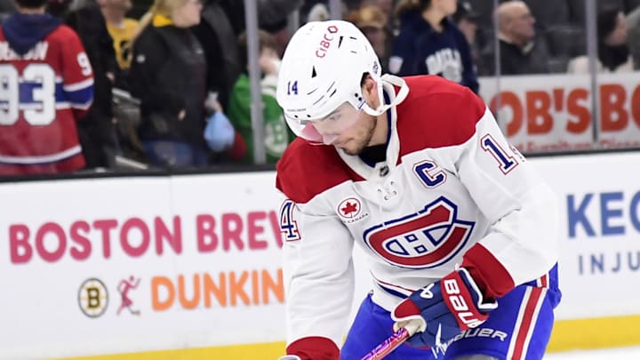 Dec 23, 2025; Boston, Massachusetts, USA; Montréal Canadiens center Nick Suzuki (14) stickhandles with the puck prior to a game against the Boston Bruins at TD Garden. Mandatory Credit: Bob DeChiara-Imagn Images