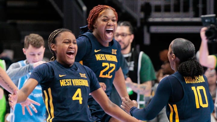 Mar 8, 2026; Kansas City, MO, USA; West Virginia Mountaineers celebrate at the end of the game against the TCU Horned Frogs at T-Mobile Center. Mandatory Credit: William Purnell-Imagn Images Mar 8, 2026; Kansas City, MO, USA; West Virginia Mountaineers celebrate at the end of the game against the TCU Horned Frogs at T-Mobile Center. Mandatory Credit: William Purnell-Imagn Images