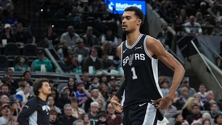 Dec 31, 2025; San Antonio, Texas, USA;  San Antonio Spurs forward Victor Wembanyama (1) leaves the game after an injury in the second half against the New York Knicks at Frost Bank Center. Mandatory Credit: Daniel Dunn-Imagn Images