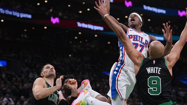 Apr 28, 2026; Boston, Massachusetts, USA; Philadelphia 76ers guard Vj Edgecombe (77) shoots the ball against Boston Celtics guard Derrick White (9) in the second quarter during game five of the first round of the 2026 NBA Playoffs at TD Garden. Mandatory Credit: David Butler II-Imagn Images