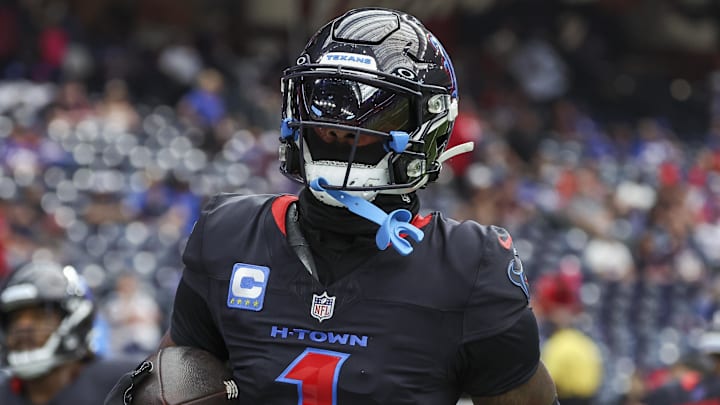 Oct 6, 2024; Houston, Texas, USA; Houston Texans wide receiver Stefon Diggs (1) warms up before the game against the Buffalo Bills at NRG Stadium. Mandatory Credit: Troy Taormina-Imagn Images Oct 6, 2024; Houston, Texas, USA; Houston Texans wide receiver Stefon Diggs (1) warms up before the game against the Buffalo Bills at NRG Stadium. Mandatory Credit: Troy Taormina-Imagn Images