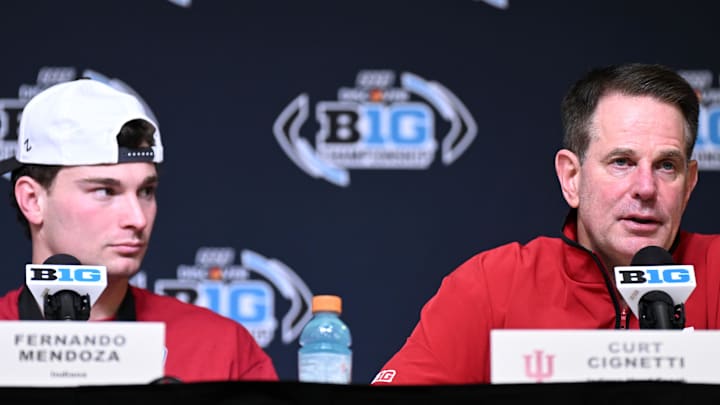 Dec 6, 2025; Indianapolis, IN, USA; Indiana Hoosiers quarterback Fernando Mendoza (15) and head coach Curt Cignetti speak in a press conference after defeating the Ohio State Buckeyes in the 2025 Big Ten championship game at Lucas Oil Stadium 