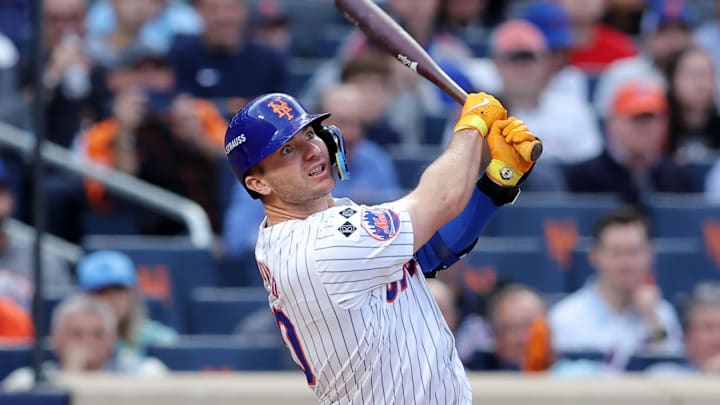 Oct 8, 2024; New York City, New York, USA; New York Mets first baseman Pete Alonso (20) hits a solo home run in the second inning against the Philadelphia Phillies during game three of the NLDS for the 2024 MLB Playoffs at Citi Field Oct 8, 2024; New York City, New York, USA; New York Mets first baseman Pete Alonso (20) hits a solo home run in the second inning against the Philadelphia Phillies during game three of the NLDS for the 2024 MLB Playoffs at Citi Field