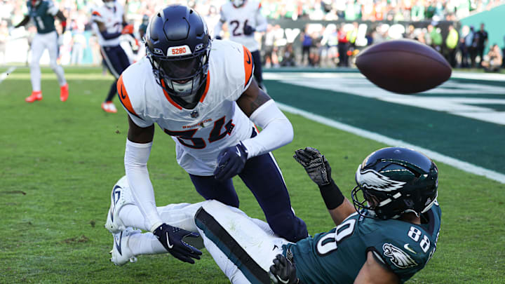 Oct 5, 2025; Philadelphia, Pennsylvania, USA; Denver Broncos safety JL Skinner (34) breaks up a pass to Philadelphia Eagles tight end Dallas Goedert (88) in the final minute at Lincoln Financial Field. 