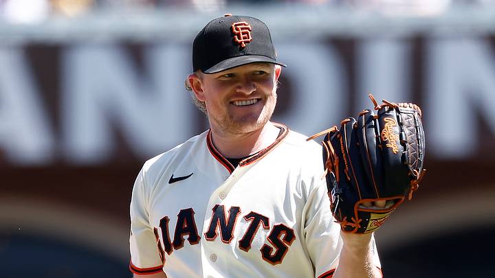 San Francisco Giants starting pitcher Logan Webb (62) smiles as he receives the ball. San Francisco Giants starting pitcher Logan Webb (62) smiles as he receives the ball.