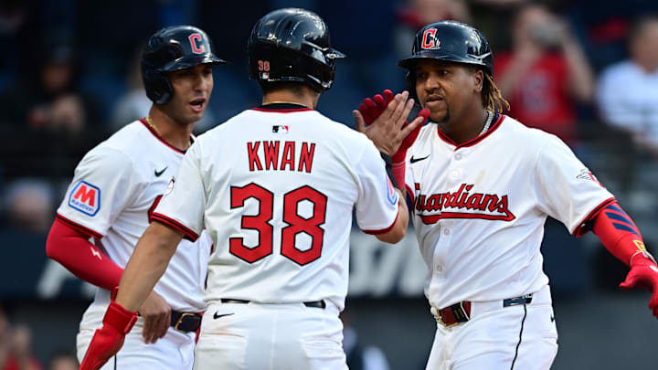 Apr 21, 2025; Cleveland, Ohio, USA; Cleveland Guardians third baseman Jose Ramirez (11) is congratulated by left fielder Steven Kwan (38) and shortstop Brayan Rocchio (4) after hitting a three run home run off New York Yankees starting pitcher Clarke Schmidt (36) during the third inning at Progressive Field. Mandatory Credit: David Dermer-Imagn Images