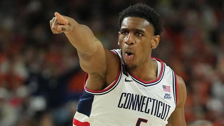 Apr 4, 2026; Indianapolis, IN, USA; UConn Huskies forward Tarris Reed Jr. (5) reacts after a play against the Illinois Fighting Illini during the first half of a semifinal of the Final Four of the men's 2026 NCAA Tournament at Lucas Oil Stadium. Apr 4, 2026; Indianapolis, IN, USA; UConn Huskies forward Tarris Reed Jr. (5) reacts after a play against the Illinois Fighting Illini during the first half of a semifinal of the Final Four of the men's 2026 NCAA Tournament at Lucas Oil Stadium.