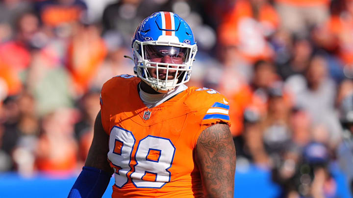 Denver Broncos defensive end John Franklin-Myers (98)