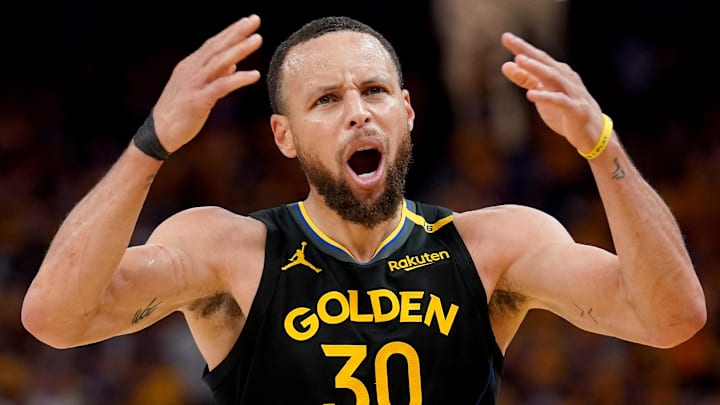 May 2, 2025; San Francisco, California, USA; Golden State Warriors guard Stephen Curry (30) reacts after being fouled against the Houston Rockets in the third quarter of game six of the first round for the 2025 NBA Playoffs at Chase Center. Mandatory Credit: Cary Edmondson-Imagn Images