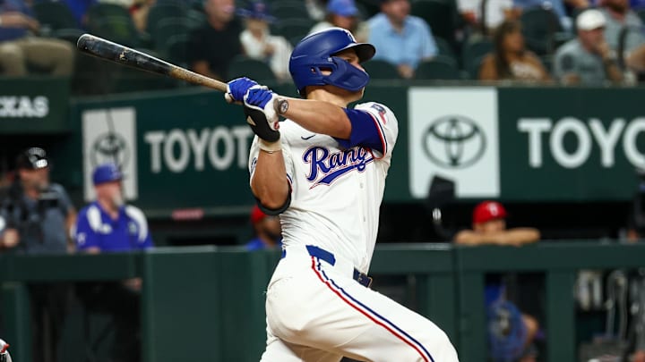 Aug 27, 2025; Arlington, Texas, USA; Texas Rangers shortstop Corey Seager (5) hits a two-run home run during the fourth inning against the Los Angeles Angels at Globe Life Field. Mandatory Credit: Kevin Jairaj-Imagn Images Aug 27, 2025; Arlington, Texas, USA; Texas Rangers shortstop Corey Seager (5) hits a two-run home run during the fourth inning against the Los Angeles Angels at Globe Life Field. Mandatory Credit: Kevin Jairaj-Imagn Images