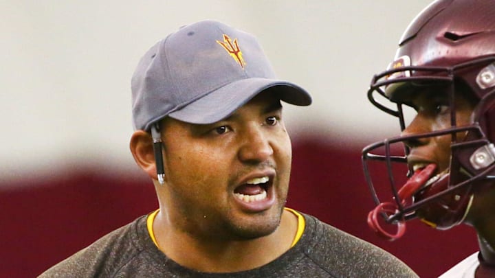 Arizona State Sun Devils coach Tony White talks to defensive back Timarcus Davis (6) during spring football practice on Feb. 6 in Tempe.

Arizona State spring football practice