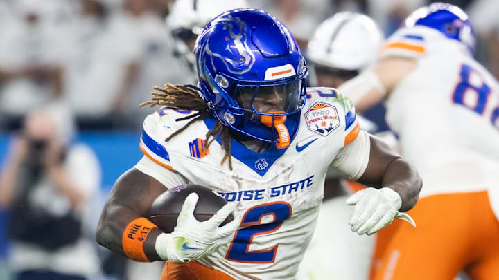 Dec 31, 2024; Glendale, AZ, USA; Boise State Broncos running back Ashton Jeanty (2) against the Penn State Nittany Lions during the Fiesta Bowl at State Farm Stadium. Mandatory Credit: Mark J. Rebilas-Imagn Images