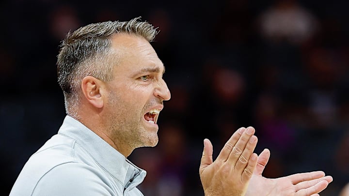 Toronto Raptors Head Coach Darko Rajakovic claps his hands during the fourth quarter against the Sacramento Kings.