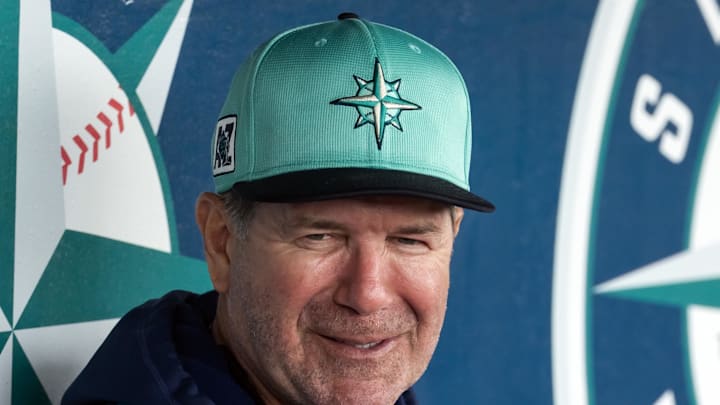 Seattle Mariners director of hitting strategy Edgar Martinez in the dugout against the Cleveland Guardians during a spring training game at Peoria Sports Complex on March 3. 