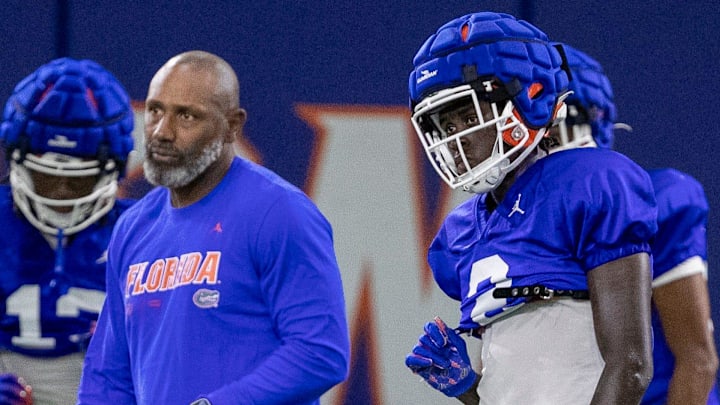 Assistant Head Coach / Secondary Cory Raymond, left, talks with Florida Gators cornerback Ja'Keem Jackson (2) while working on a drill at Gary Condron Family Indoor Practice Facility in Gainesville, FL on Wednesday, August 9, 2023. [Alan Youngblood/Gainesville Sun]
