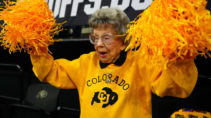 Feb 22, 2025; Boulder, Colorado, USA; Colorado Buffaloes fan Peggy Coppom cheers in the first half against the Baylor Bears at the CU Events Center. Mandatory Credit: Ron Chenoy-Imagn Images