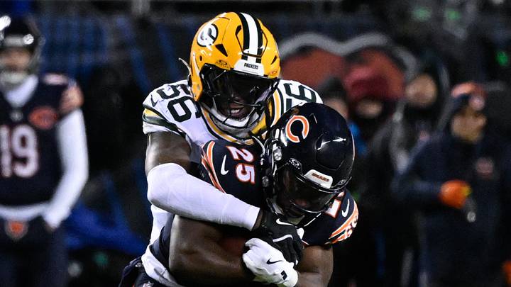 Green Bay Packers linebacker Edgerrin Cooper (56) takes down Chicago Bears running back Kyle Monangai in the wild-card game. Green Bay Packers linebacker Edgerrin Cooper (56) takes down Chicago Bears running back Kyle Monangai in the wild-card game.