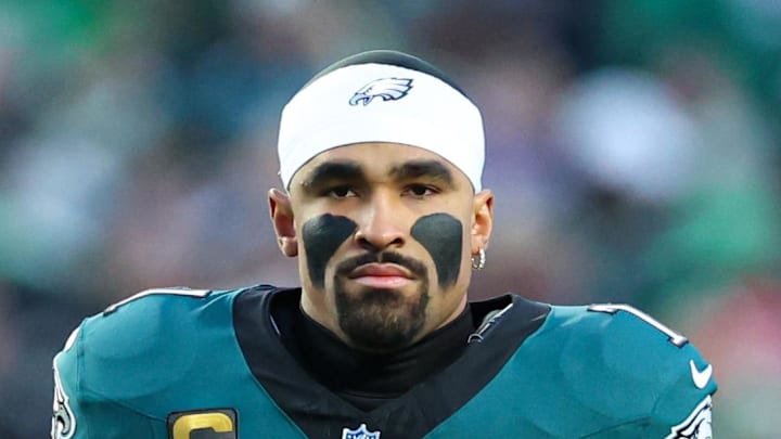 Jan 11, 2026; Philadelphia, PA, USA; Philadelphia Eagles quarterback Jalen Hurts (1) after the anthem against the San Francisco 49ers in an NFC Wild Card Round game at Lincoln Financial Field. Mandatory Credit: Bill Streicher-Imagn Images Jan 11, 2026; Philadelphia, PA, USA; Philadelphia Eagles quarterback Jalen Hurts (1) after the anthem against the San Francisco 49ers in an NFC Wild Card Round game at Lincoln Financial Field. Mandatory Credit: Bill Streicher-Imagn Images