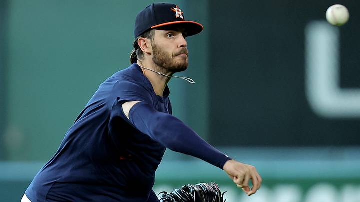 Pitcher Spencer Arrighetti (41) warms up prior to the game