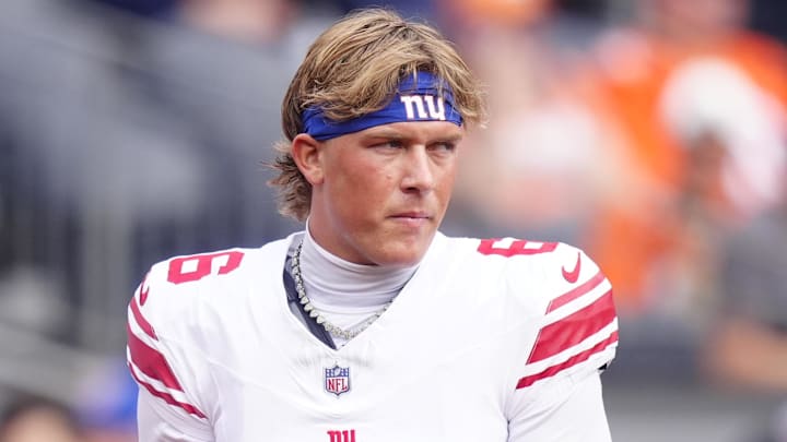 Oct 19, 2025; Denver, Colorado, USA; New York Giants quarterback Jaxson Dart (6) warms up before the game against the Denver Broncos at Empower Field at Mile High.