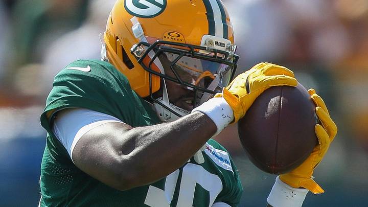Green Bay Packers safety Murvin Kenion III catches a pass during training camp. Green Bay Packers safety Murvin Kenion III catches a pass during training camp.