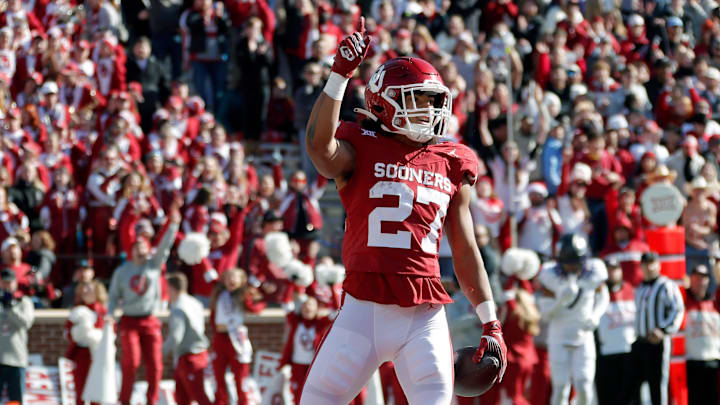 Oklahoma Sooners running back Gavin Sawchuk (27) celebrates after a touchdown during a college football game between the University of Oklahoma Sooners (OU) and the TCU Horned Frogs at Gaylord Family-Oklahoma Memorial Stadium in Norman, Okla., Friday, Nov. 24, 2023. Oklahoma won 69-45.
