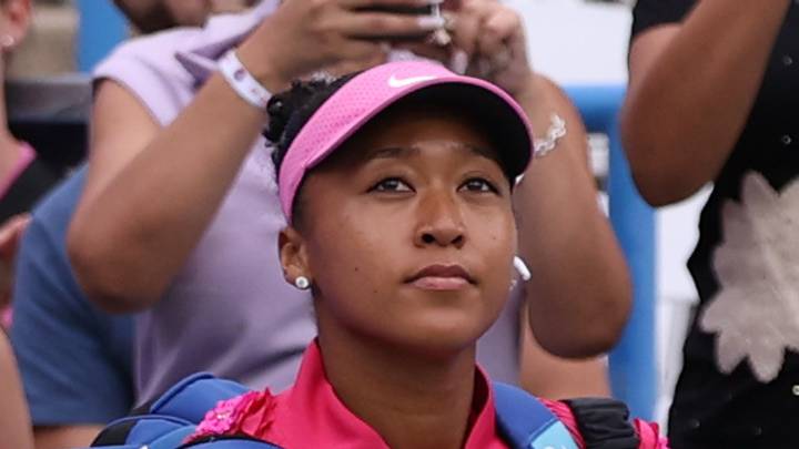 Naomi Osaka walks onto the court at the Citi Open
