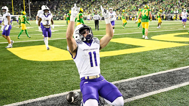 Dec 20, 2025; Eugene, OR, USA; James Madison Dukes wide receiver Nick Degennaro (11) celebrates after scoring a touchdown during the third quarter against the Oregon Ducks at Autzen Stadium. Mandatory Credit: Troy Wayrynen-Imagn Images