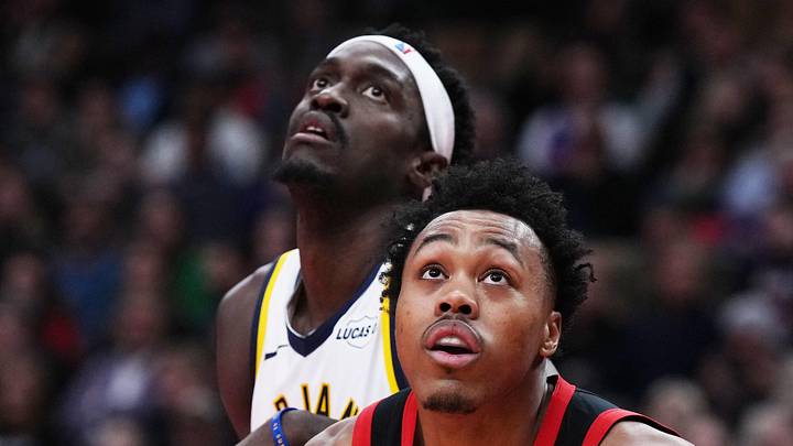 Indiana Pacers forward Pascal Siakam battles Toronto Raptors forward Scottie Barnes for a rebound. Indiana Pacers forward Pascal Siakam battles Toronto Raptors forward Scottie Barnes for a rebound.
