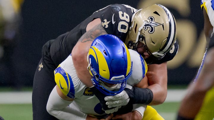 Dec 1, 2024; New Orleans, Louisiana, USA; New Orleans Saints defensive tackle Bryan Bresee (90) tackles Los Angeles Rams quarterback Matthew Stafford (9) during the second half at Caesars Superdome. Mandatory Credit: Matthew Hinton-Imagn Images Dec 1, 2024; New Orleans, Louisiana, USA; New Orleans Saints defensive tackle Bryan Bresee (90) tackles Los Angeles Rams quarterback Matthew Stafford (9) during the second half at Caesars Superdome. Mandatory Credit: Matthew Hinton-Imagn Images