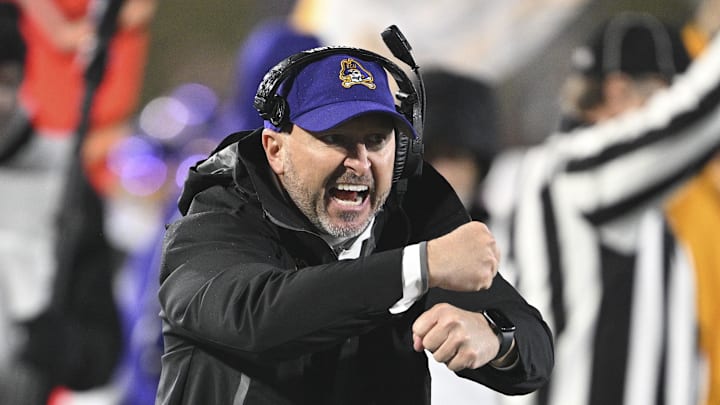 Dec 28, 2024; Annapolis, MD, USA; East Carolina Pirates head coach Blake Harrell reacts during the first half of the Go Bowling Military Bowl against the North Carolina State Wolfpack at Navy-Marine Corps Memorial Stadium. Mandatory Credit: Tommy Gilligan-Imagn Images Dec 28, 2024; Annapolis, MD, USA; East Carolina Pirates head coach Blake Harrell reacts during the first half of the Go Bowling Military Bowl against the North Carolina State Wolfpack at Navy-Marine Corps Memorial Stadium. Mandatory Credit: Tommy Gilligan-Imagn Images