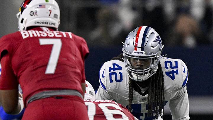 Nov 3, 2025; Arlington, Texas, USA; Dallas Cowboys defensive end Jadeveon Clowney (42) watches Arizona Cardinals quarterback Jacoby Brissett (7) during the game between the Dallas Cowboys and the Arizona Cardinals at AT&T Stadium. Mandatory Credit: Jerome Miron-Imagn Images Nov 3, 2025; Arlington, Texas, USA; Dallas Cowboys defensive end Jadeveon Clowney (42) watches Arizona Cardinals quarterback Jacoby Brissett (7) during the game between the Dallas Cowboys and the Arizona Cardinals at AT&T Stadium. Mandatory Credit: Jerome Miron-Imagn Images
