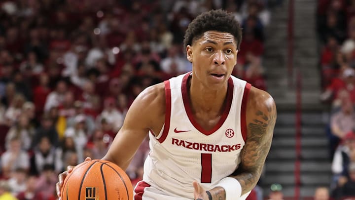 Arkansas Razorbacks guard Meleek Thomas (1) drives against Missouri Tigers guard Jayden Stone (17) during the first half at Bud Walton Arena. Arkansas Razorbacks guard Meleek Thomas (1) drives against Missouri Tigers guard Jayden Stone (17) during the first half at Bud Walton Arena.
