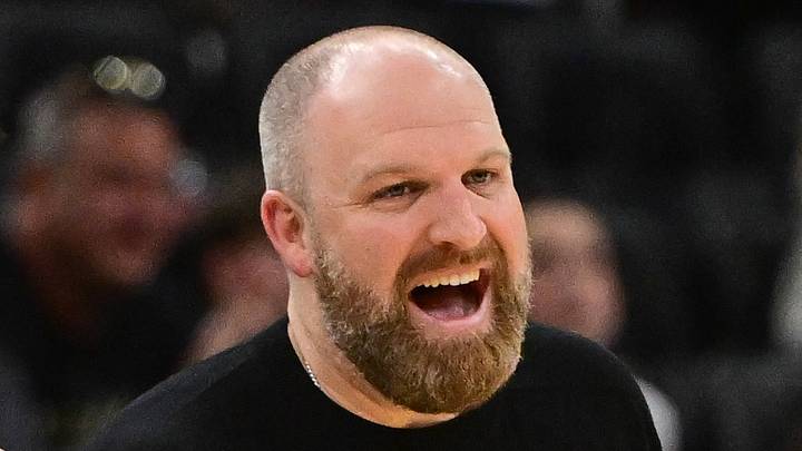 Milwaukee Bucks head coach Taylor Jenkins greets guard Kevin Porter (7) after a score against the Minnesota Timberwolves at Fiserv Forum on October 5, 2026.
