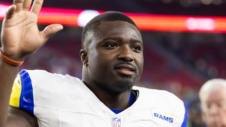 Dec 7, 2025; Glendale, Arizona, USA; Los Angeles Rams linebacker Byron Young (0) against the Arizona Cardinals at State Farm Stadium. Mandatory Credit: Mark J. Rebilas-Imagn Images