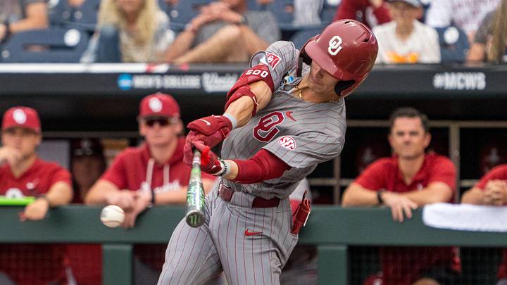 Oklahoma Sooners third baseman Camden Johnson (9) hits a single against the North Carolina Tar Heels during the first inning at Charles Schwab Field. Oklahoma Sooners third baseman Camden Johnson (9) hits a single against the North Carolina Tar Heels during the first inning at Charles Schwab Field.