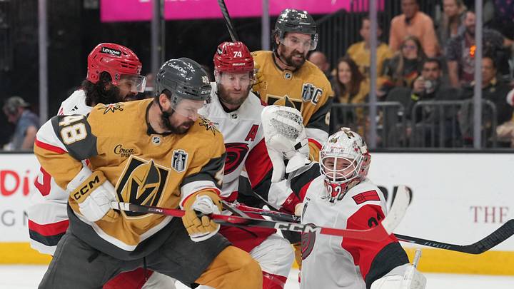 Jun 9, 2026; Las Vegas, Nevada, USA; Carolina Hurricanes goaltender Brandon Bussi (32) makes a save against Vegas Golden Knights center Tomas Hertl (48) during the 3rd period in game four of the 2026 Stanley Cup Final at T-Mobile Arena. Mandatory Credit: Lucas Peltier-Imagn Images