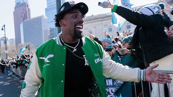 Former Philadelphia Eagles defensive tackle Thomas Booker IV (59) celebrates with fans during the Super Bowl LIX championship parade and rally.
