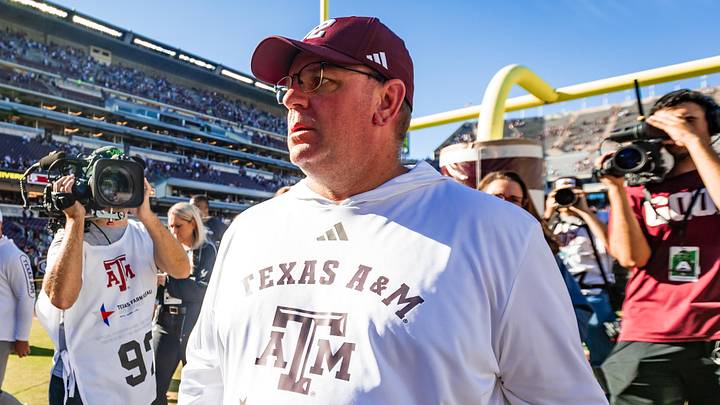 Texas A&M Aggies head coach Mike Elko walks off the field after defeating the Samford Bulldogs 48-0 in a game at Kyle Field.