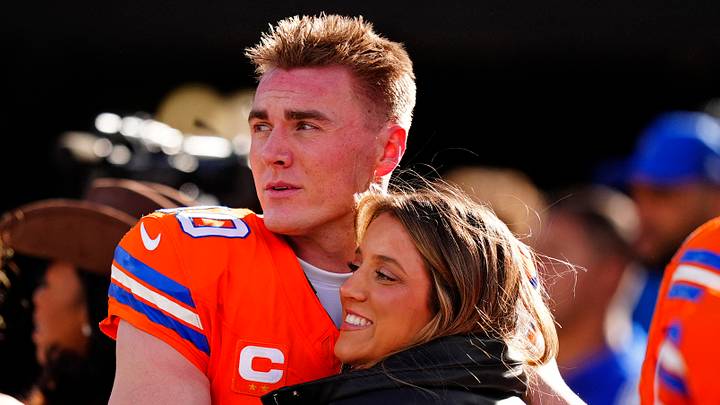 Denver Broncos quarterback Bo Nix hugs wife, Izzy Nix before the game against the Seattle Seahawks. Denver Broncos quarterback Bo Nix hugs wife, Izzy Nix before the game against the Seattle Seahawks.