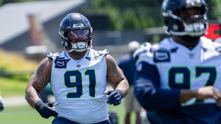 Jun 11, 2025; Renton, WA, USA; Seattle Seahawks defensive lineman Byron Murphy II (91) takes part in drills during mini-camp at Virginia Mason Athletic Center.